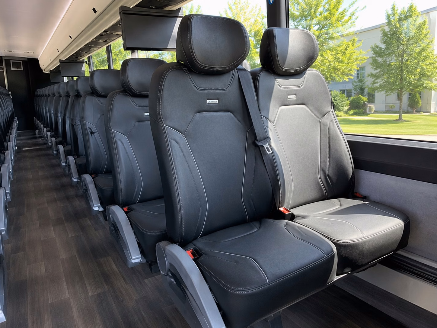 charter buses for newton corporate events at local conference venues