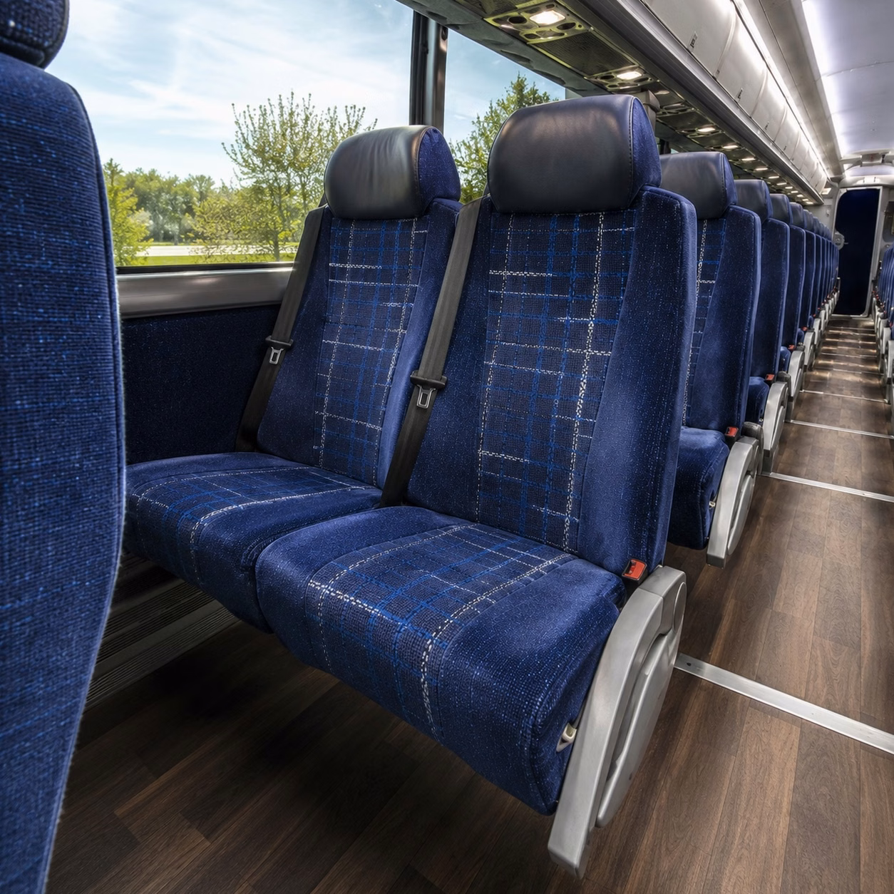 how time of year and peak season affect charter bus rental prices in newton